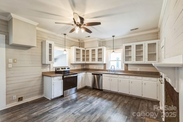 3607 Austin Rd, Monroe, NC 28112 - kitchen featuring dark wood finished floors, ceiling fan, a sink, appliances with stainless steel finishes, and dark countertops