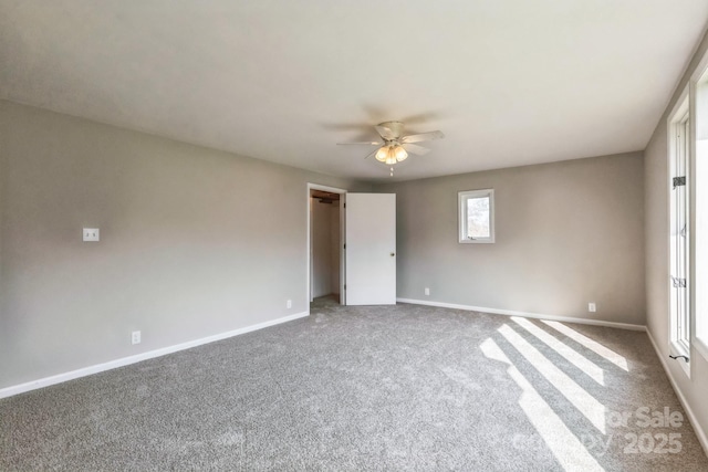 3607 Austin Rd, Monroe, NC 28112 - unfurnished room with baseboards, ceiling fan, and carpet flooring