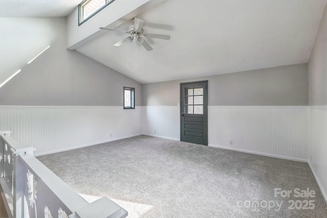 3607 Austin Rd, Monroe, NC 28112 - unfurnished room featuring carpet flooring, wainscoting, a ceiling fan, and vaulted ceiling