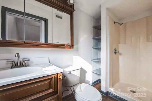 3607 Austin Rd, Monroe, NC 28112 - full bath featuring visible vents, a shower stall, toilet, and vanity