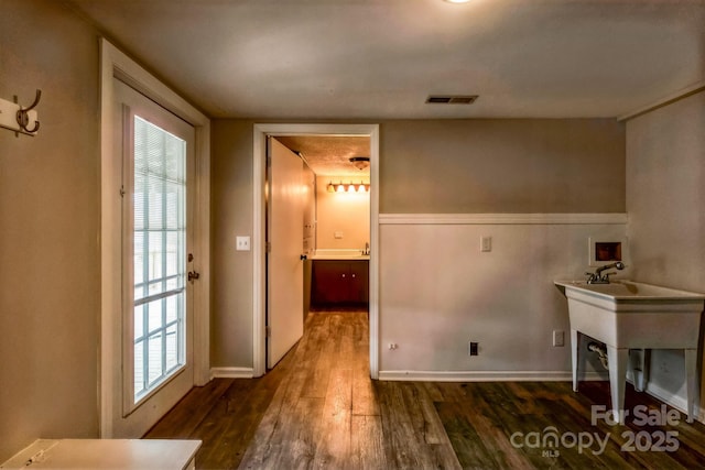 3607 Austin Rd, Monroe, NC 28112 - unfurnished office featuring visible vents, baseboards, and dark wood-style floors