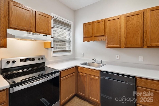 kitchen with under cabinet range hood, a sink, stainless steel electric stove, light countertops, and dishwashing machine