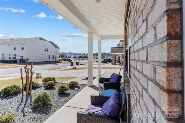 view of patio with a residential view