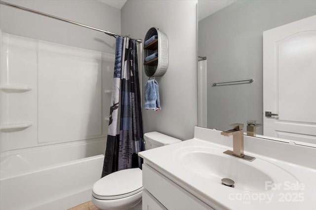 bathroom featuring vanity, toilet, and shower / tub combo with curtain