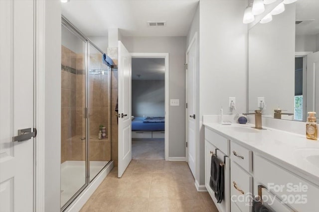 full bath featuring a sink, visible vents, ensuite bath, and a stall shower