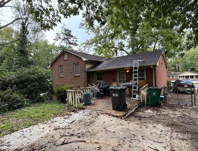 back of property with brick siding