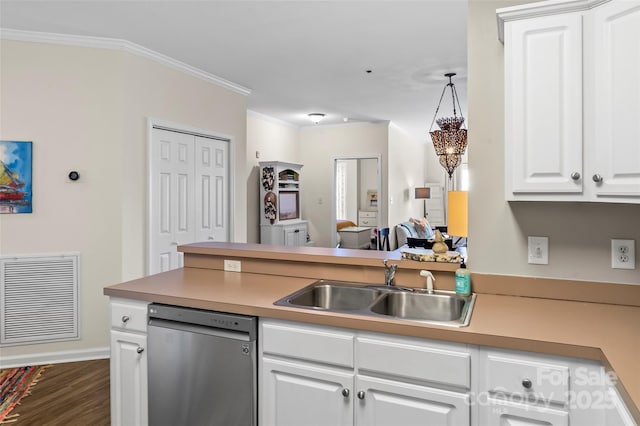 kitchen with visible vents, a sink, stainless steel dishwasher, a peninsula, and crown molding