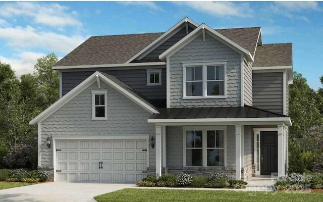 craftsman inspired home with metal roof, concrete driveway, a standing seam roof, and a shingled roof