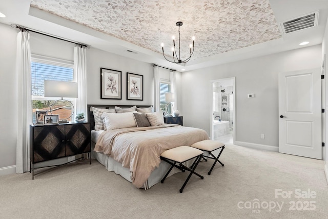 bedroom featuring visible vents, baseboards, a raised ceiling, a notable chandelier, and light colored carpet