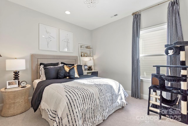 bedroom featuring carpet flooring, baseboards, and visible vents