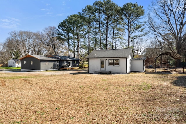 exterior space featuring an outbuilding