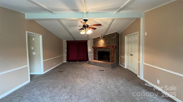 unfurnished living room with a brick fireplace, vaulted ceiling with beams, ceiling fan, and carpet floors