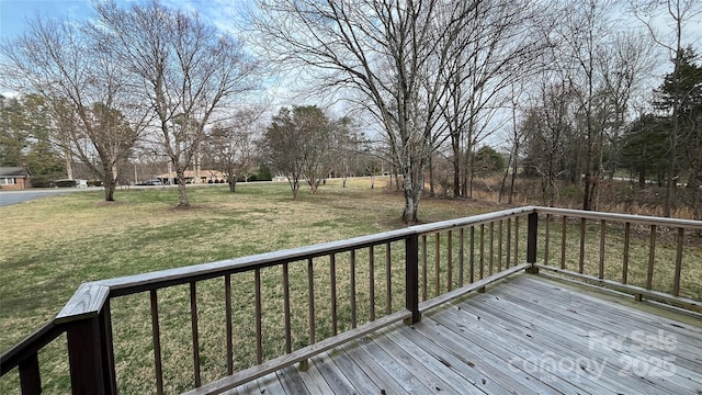 deck featuring a lawn