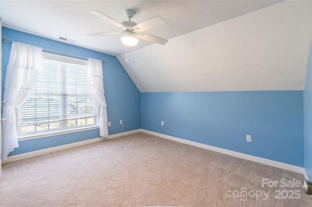 bonus room with visible vents, baseboards, carpet floors, lofted ceiling, and ceiling fan