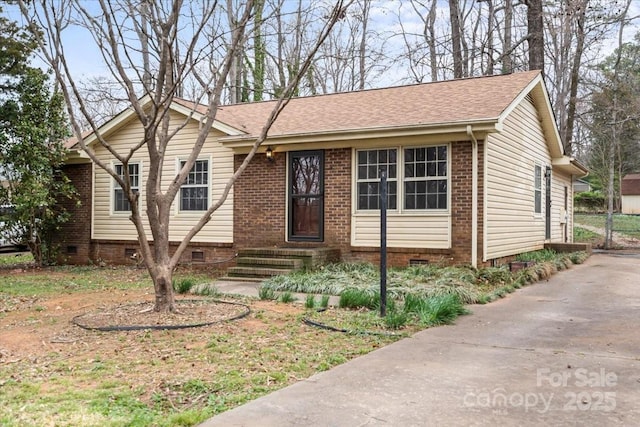 single story home featuring crawl space, roof with shingles, and entry steps