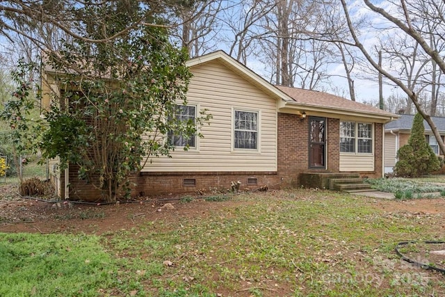 view of front of home featuring crawl space