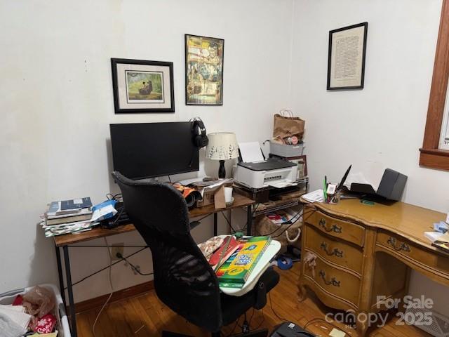 office space featuring wood finished floors