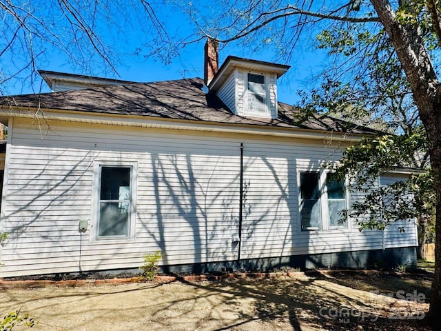 149 Crescent Dr, Chesterfield, SC 29709 - view of property exterior featuring a chimney