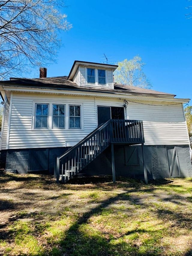 149 Crescent Dr, Chesterfield, SC 29709 - back of house featuring stairway, a yard, and a chimney