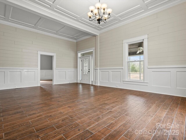 149 Crescent Dr, Chesterfield, SC 29709 - interior space with a decorative wall, a chandelier, crown molding, dark wood-type flooring, and coffered ceiling