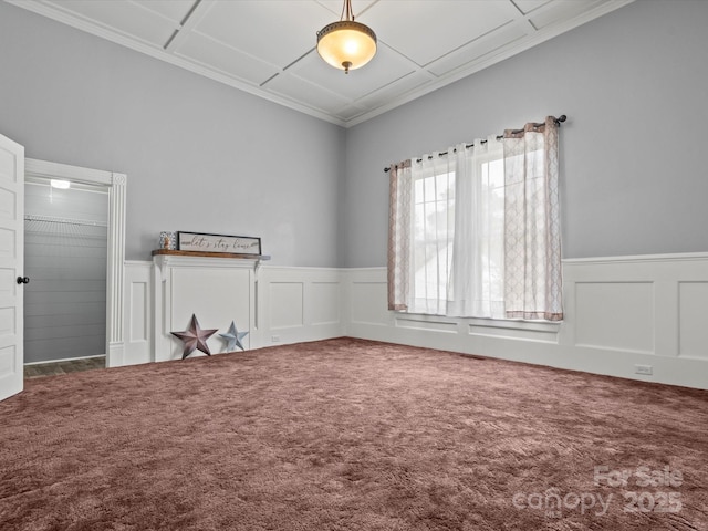 149 Crescent Dr, Chesterfield, SC 29709 - spare room with carpet flooring, a wainscoted wall, and ornamental molding