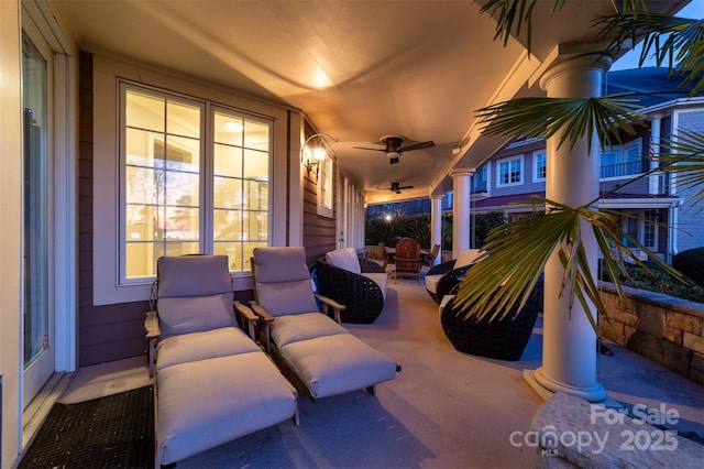 view of patio featuring a porch and a ceiling fan