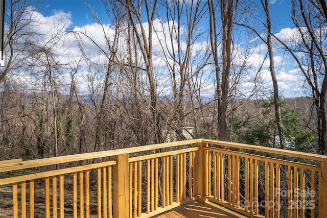 deck with a wooded view