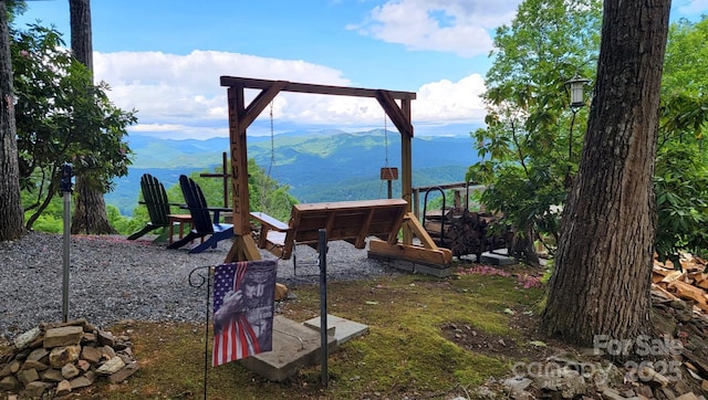 view of play area featuring a mountain view