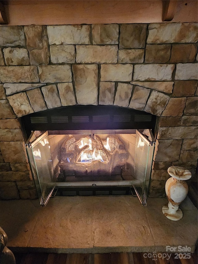 interior details featuring a fireplace