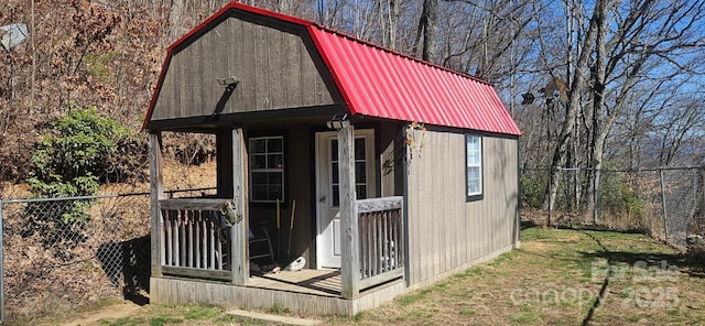 view of outdoor structure with an outdoor structure and fence