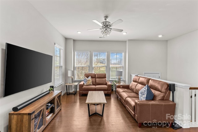 living room with recessed lighting, dark wood-style flooring, and ceiling fan