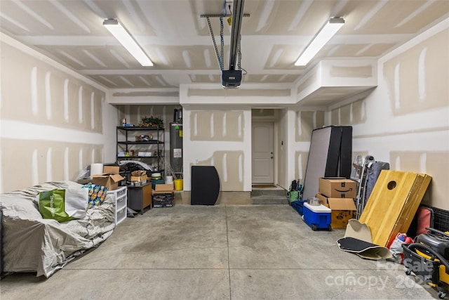 garage featuring a garage door opener and water heater