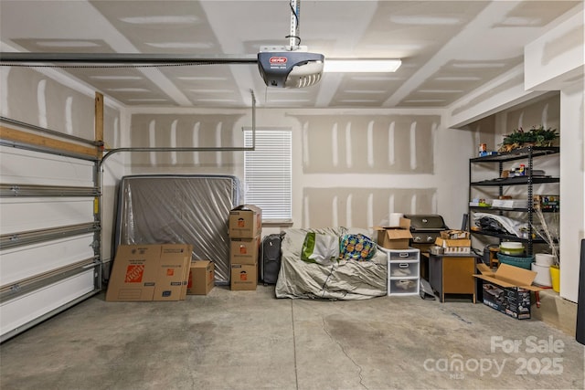 garage featuring a garage door opener