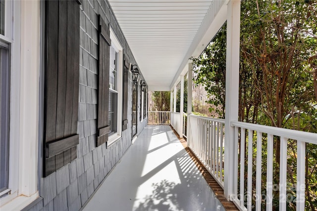 balcony featuring a porch