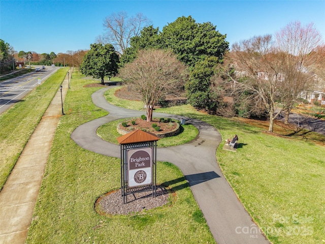 view of community featuring a yard