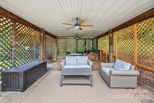 view of patio featuring an outdoor living space and ceiling fan