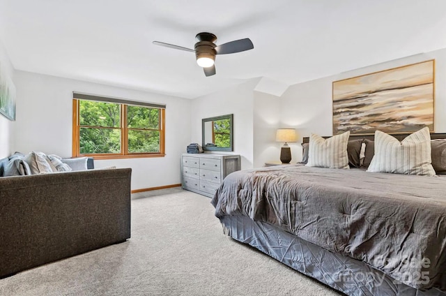 bedroom with baseboards, a ceiling fan, and carpet flooring