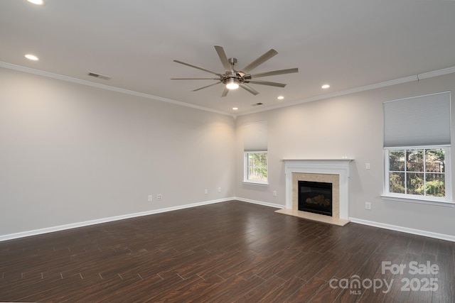 unfurnished living room featuring visible vents, baseboards, ceiling fan, and dark wood-style flooring