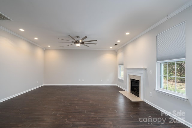 unfurnished living room featuring dark wood-style floors, baseboards, ceiling fan, and a high end fireplace