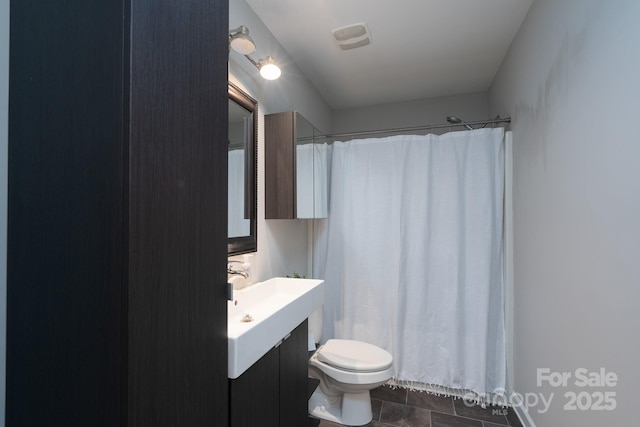 full bath with vanity, tile patterned floors, toilet, and a shower with curtain