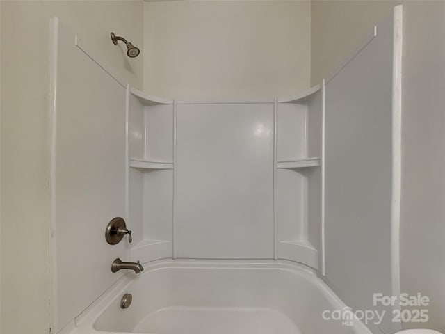 bathroom with shower / bath combination