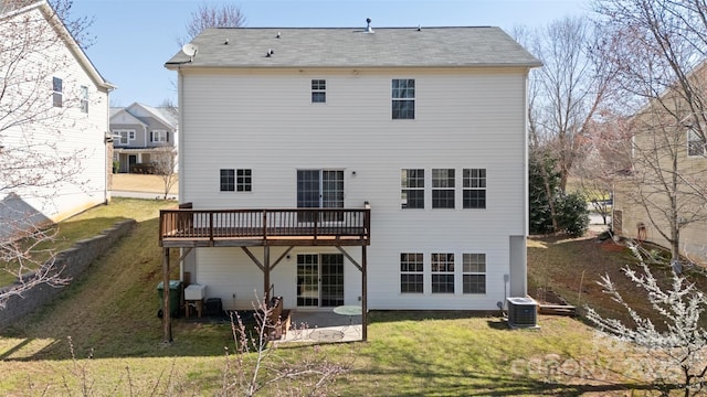 back of house featuring a yard, a patio, a deck, and central air condition unit