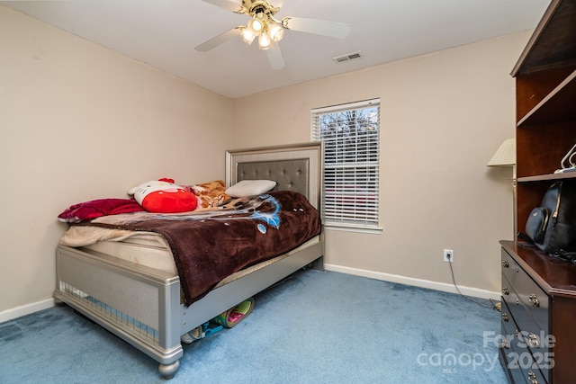 bedroom featuring visible vents, baseboards, carpet, and a ceiling fan