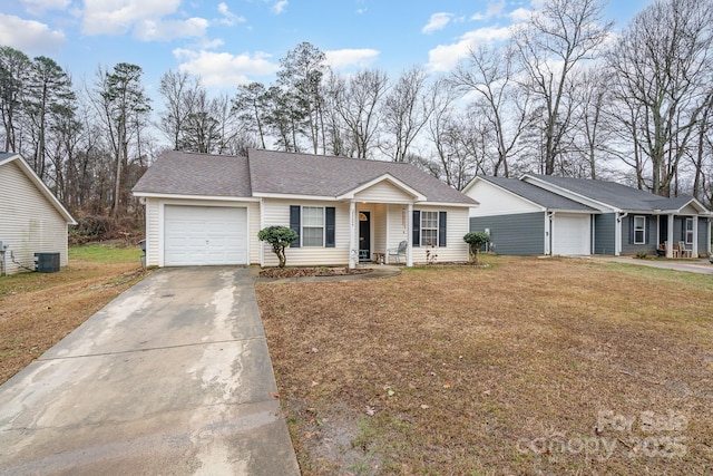 ranch-style home with central air condition unit, concrete driveway, a front yard, roof with shingles, and a garage