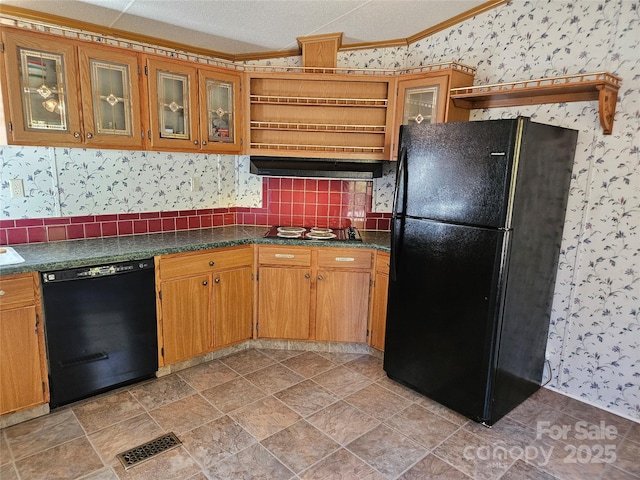 kitchen with dark countertops, visible vents, wallpapered walls, black appliances, and open shelves