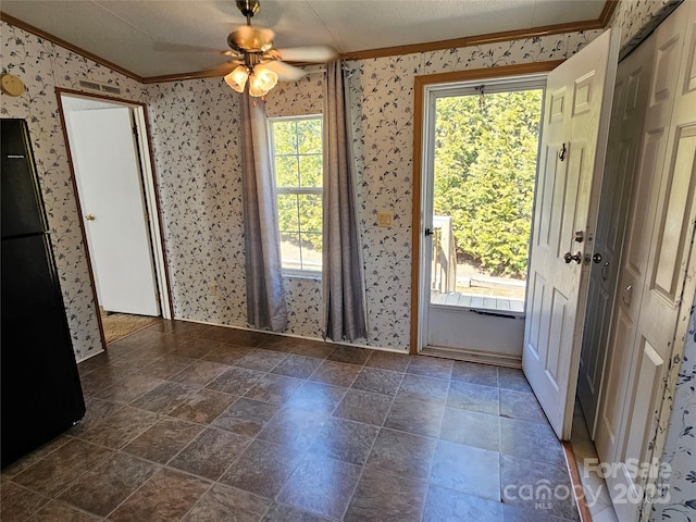 interior space with wallpapered walls, crown molding, and a ceiling fan