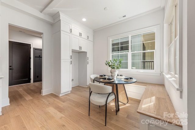2021 S St, Charlotte, NC 28208 - dining space featuring light wood-style flooring, recessed lighting, baseboards, and crown molding