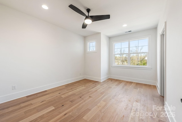 2021 S St, Charlotte, NC 28208 - unfurnished room with ceiling fan, baseboards, light wood-style flooring, and recessed lighting