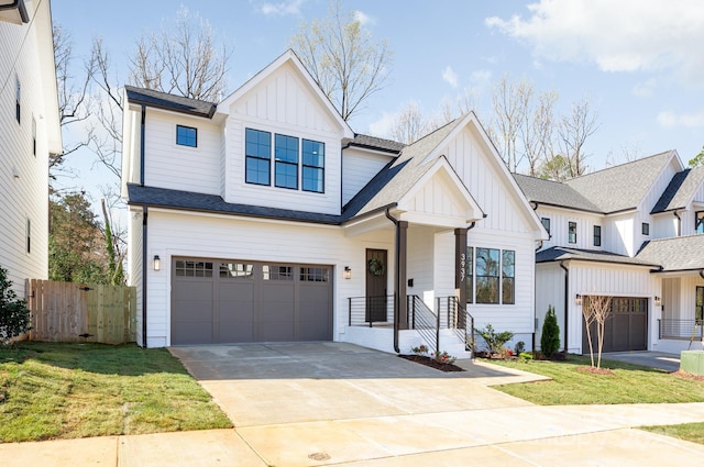 2013 S St, Charlotte, NC 28208 - modern farmhouse featuring board and batten siding, a garage, concrete driveway, and a shingled roof
