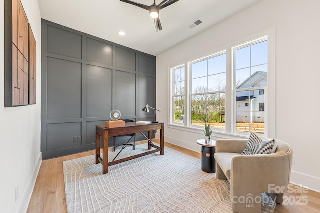 2013 S St, Charlotte, NC 28208 - office space with baseboards, a ceiling fan, light wood-style flooring, a decorative wall, and recessed lighting